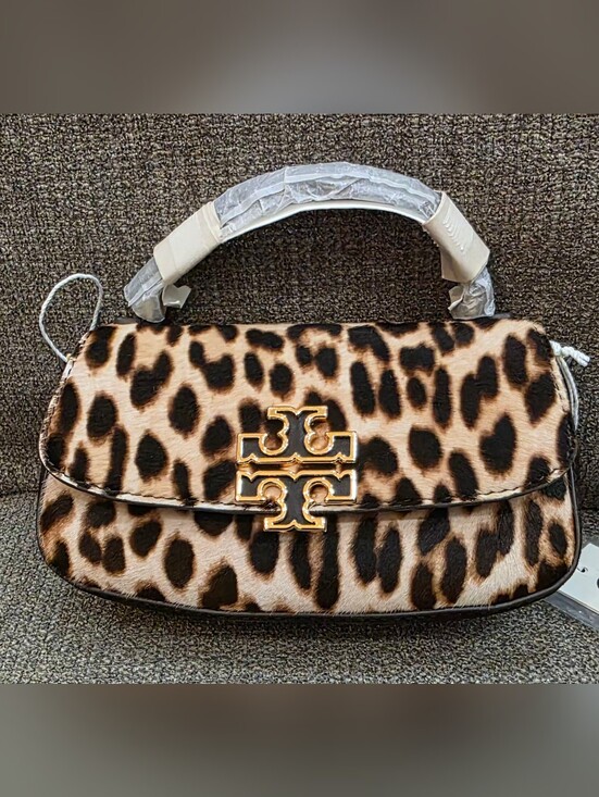 Tory Burch Handbags - Tory Burch Britten Haircalf Mini Top Handle.